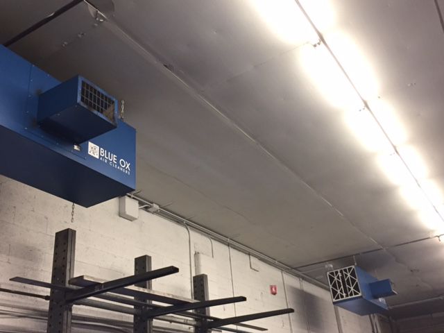 Blue Ox OX3500C air filtration systems shown installed at Smith Production LLC. to remove fume and smoke.